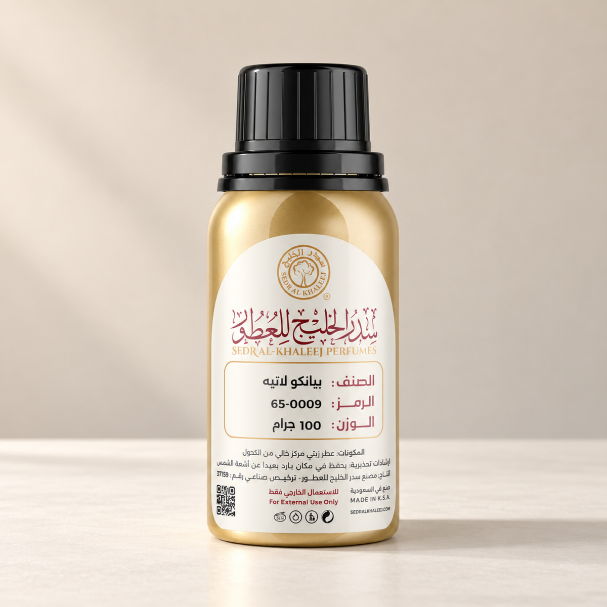 Sedr Al-Khaleej bianco latte perfume oil; one closed original bottle on matte milk-white ceramic, against plain light-latte wall.