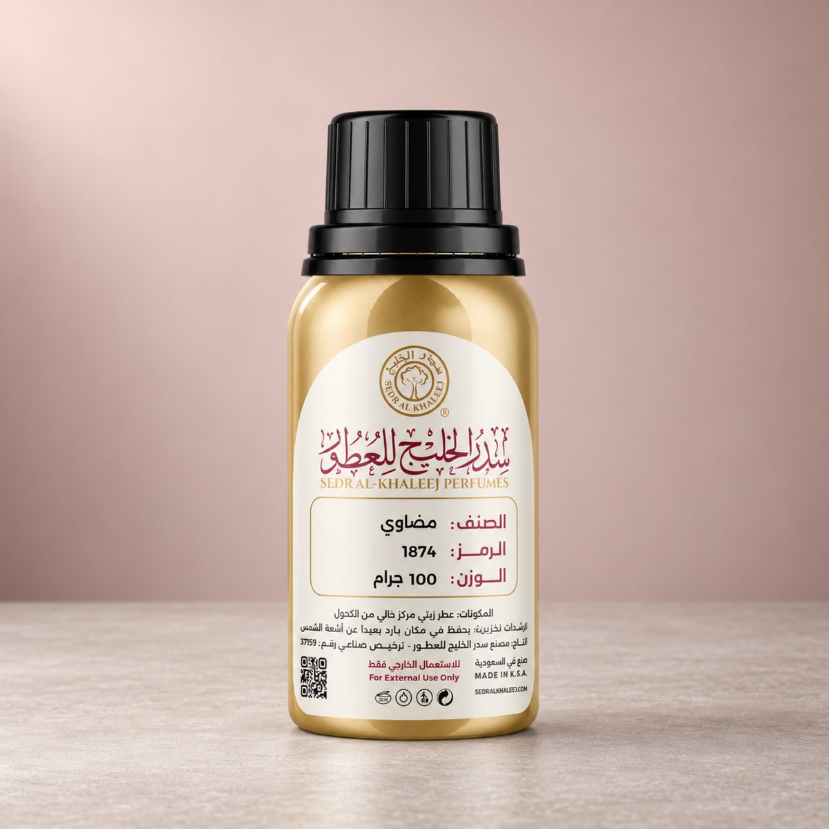 Sedr Al-Khaleej madawi perfume oil; one closed original bottle on pearl-grey matte mineral resin, against plain soft latte-pink wall.
