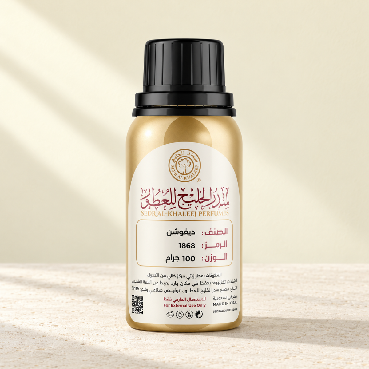 Sedr Al-Khaleej devotion perfume oil; one closed original bottle on matte ivory limestone before a pale citron cream, ivory backdrop.